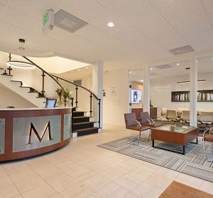 <span>McGuire RealEstate Headquarters</span><i>→</i>